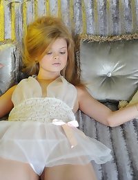 Innocent teen on sofa