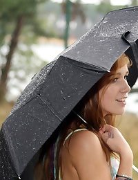 Teen in the rain